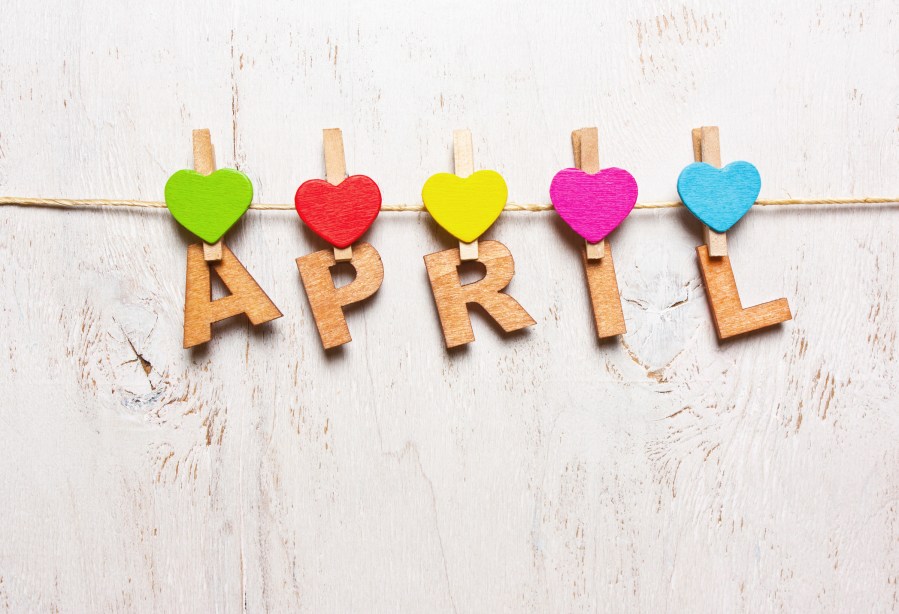 the word "april" from the wooden letters