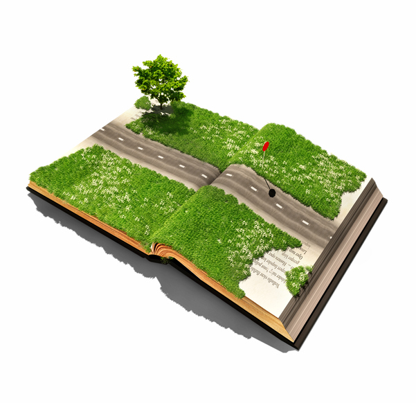 An open book covered with grass and bisected by a road crossing from page to page.